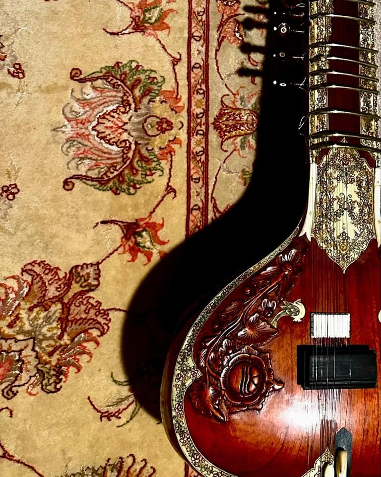 Sitar on a Persian rug
